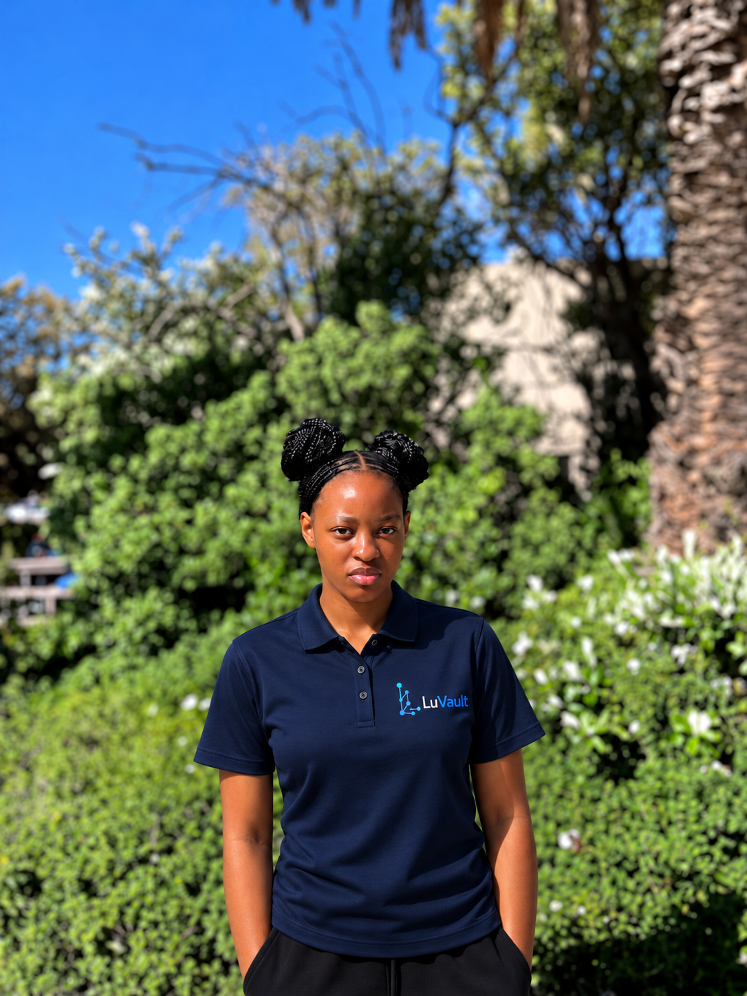 Sisanda Shoba wearing a LuVault branded shirt